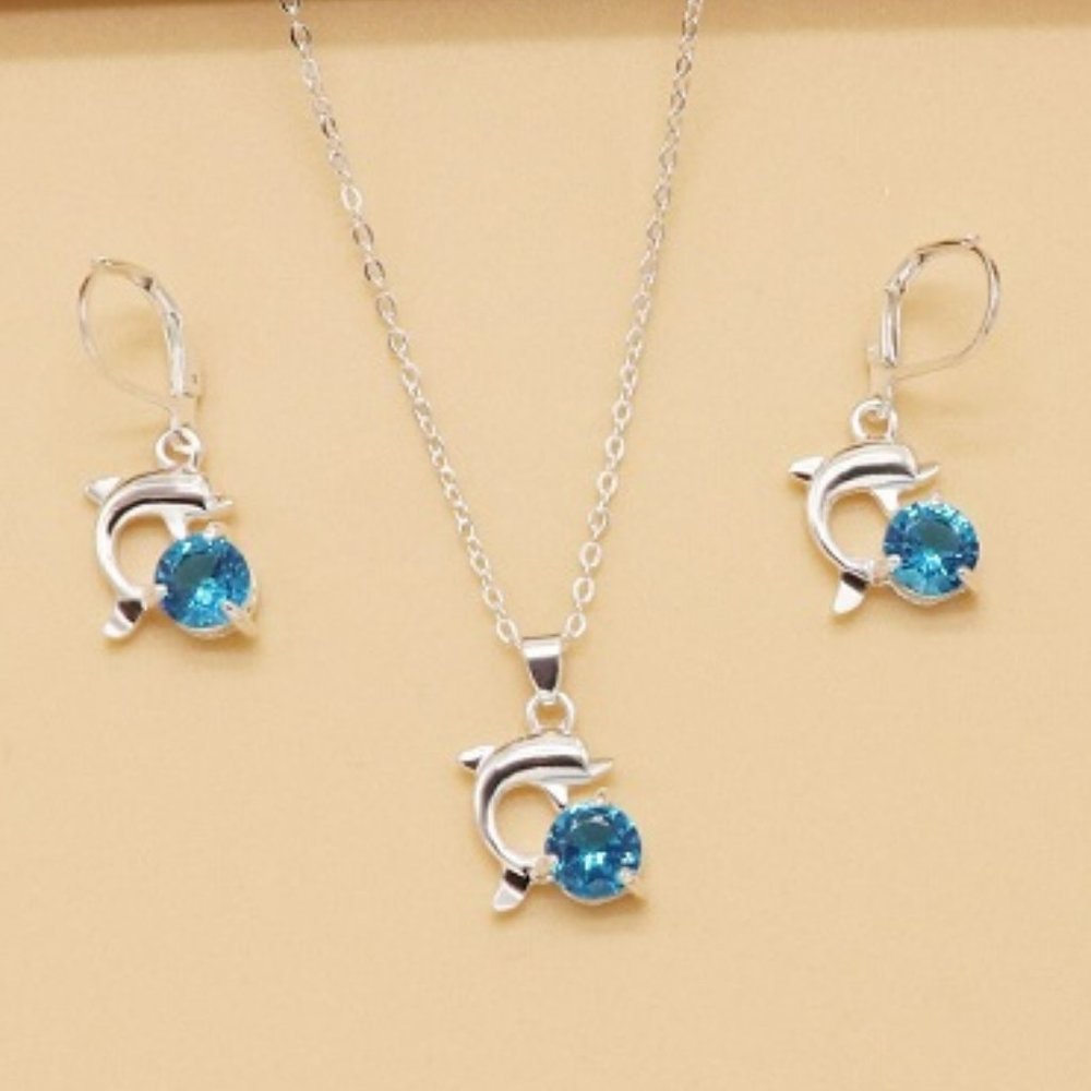Silver Colored Chain with Dolphins Swimming Near Blue Gems Jewelry Set